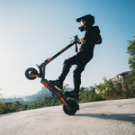 KuKirin G2 VMP rider demonstrating suspension outdoors