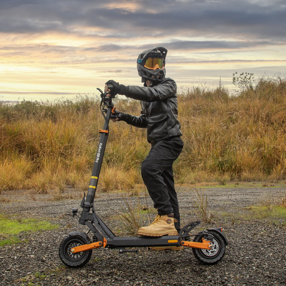 Rider using the KuKirin G2 Pro VMP electric scooter