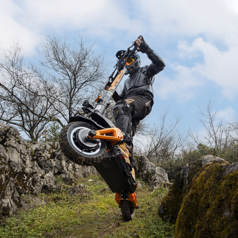 Rider using the KuKirin G3 Pro on rocky terrain